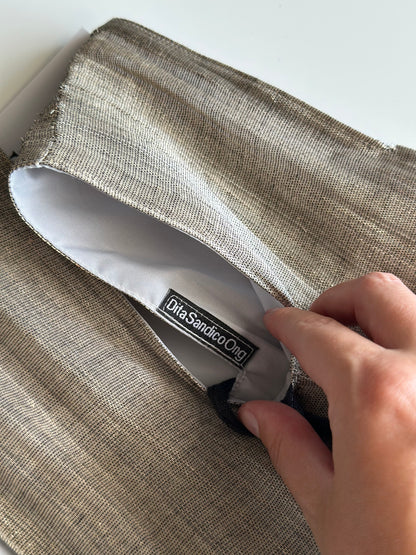 An elegant hand-held clutch