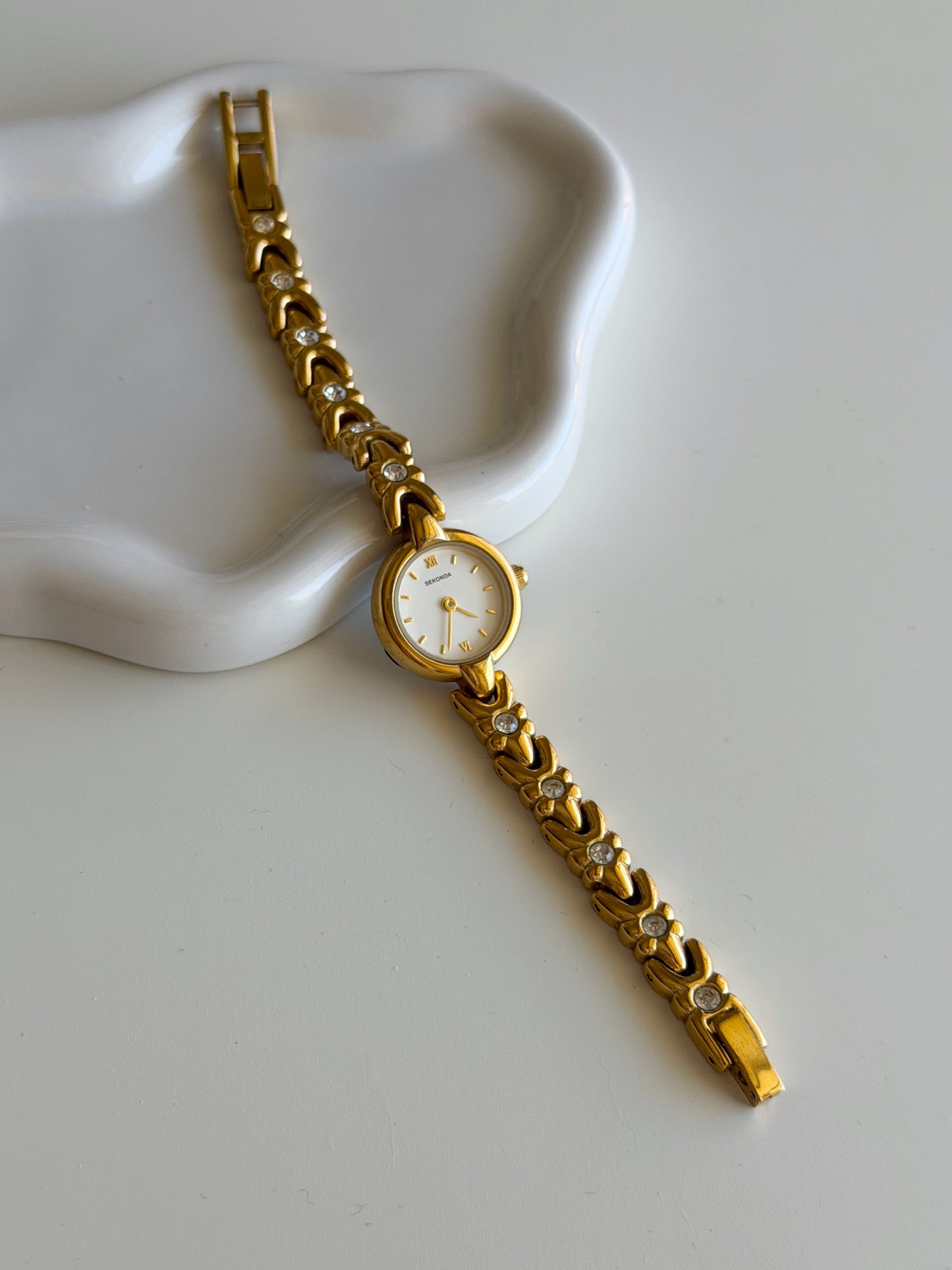 Vintage Sekonda gold-tone watch with crystals