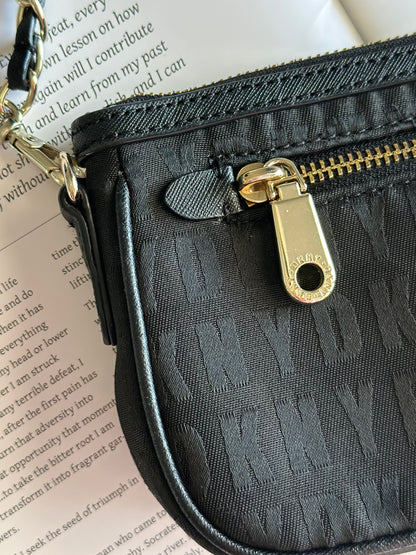 Stunning pre-loved black DKNY baguette bag