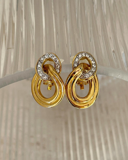 Beautiful and elegant vintage gold tone clip-on earrings with rhinestones