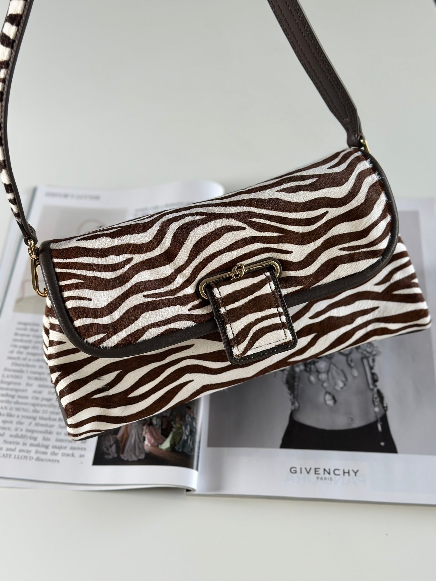 Striking Dune London shoulder zebra bag