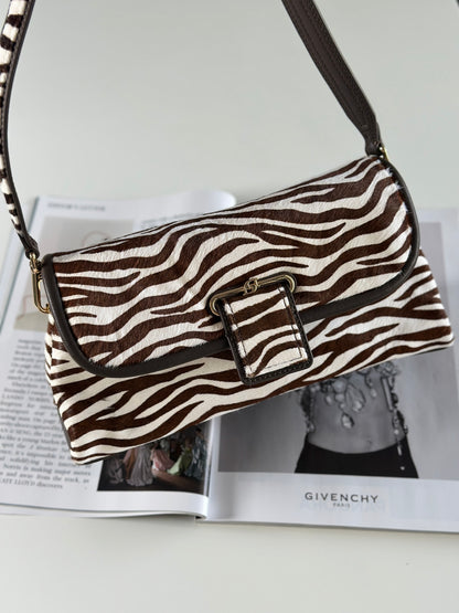 Striking Dune London shoulder zebra bag