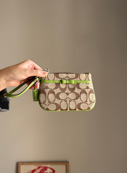 Vintage Coach wristlet with lime green bow