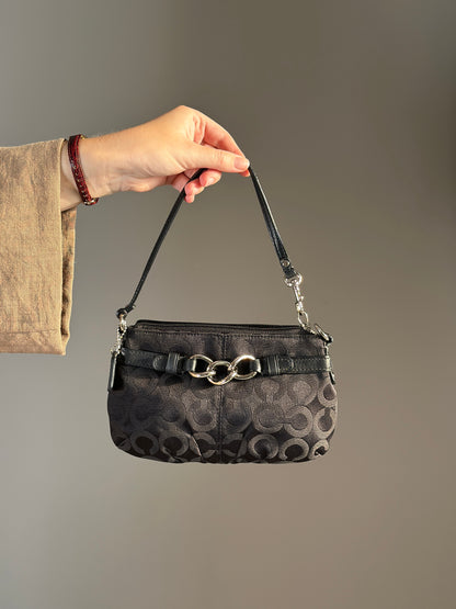 Timeless vintage authentic Coach wristlet bag