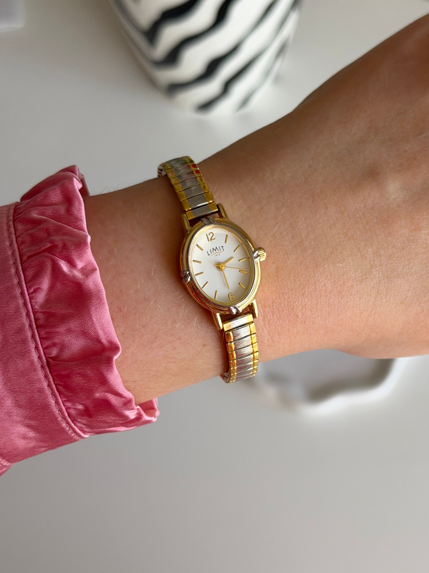 Lovely two-tone Limit watch with engraving on the case back