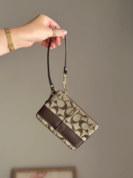 Iconic vintage brown Coach wristlet