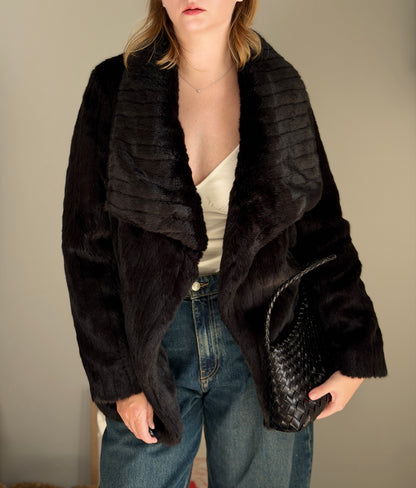Stunning black faux fur coat with a dramatic look