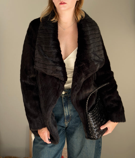 Stunning black faux fur coat with a dramatic look