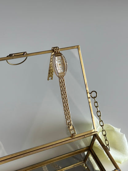 Beautiful gold-tone Embassy watch with crystals