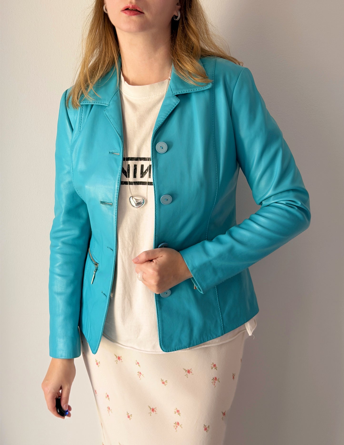Vintage leather jacket in striking turquoise shade