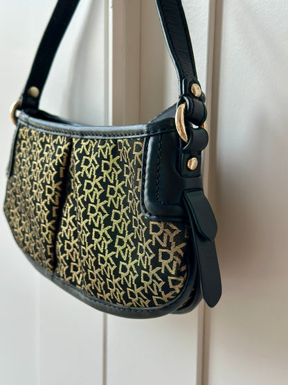 Chic vintage DKNY bag in black and gold