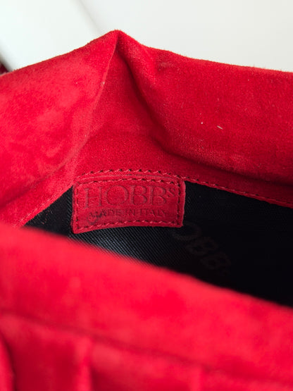 Vibrant red bag crafted from soft suede by Hobbs