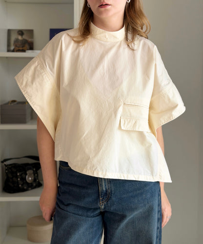 Minimalist cotton top in a soft cream shade