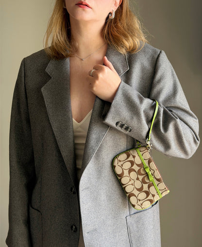 Vintage Coach wristlet with lime green bow