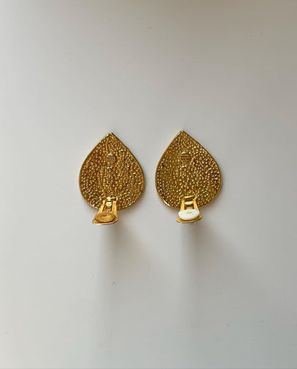 One-of-a-kind vintage enamel clip-on earrings in a beautiful gold/black tone