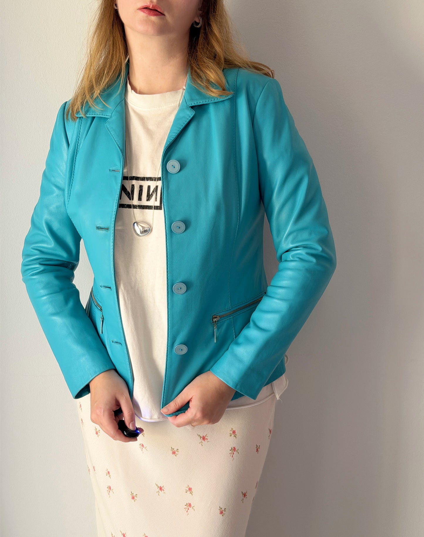 Vintage leather jacket in striking turquoise shade