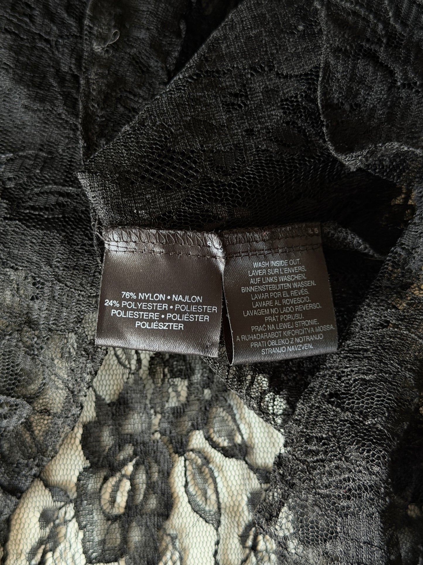 Sophisticated black lace blouse by Yessica