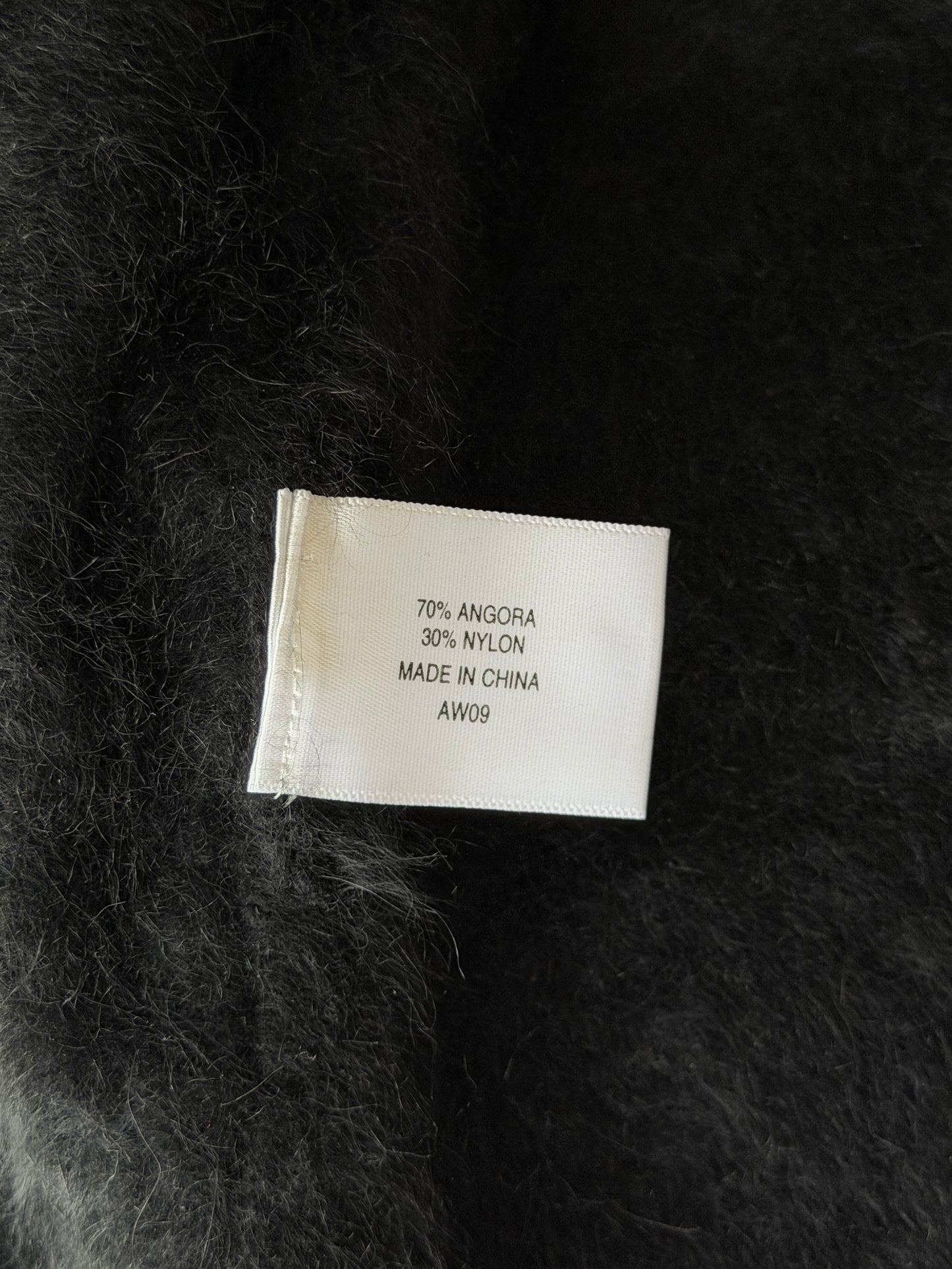 Chic black cropped angora cardigan