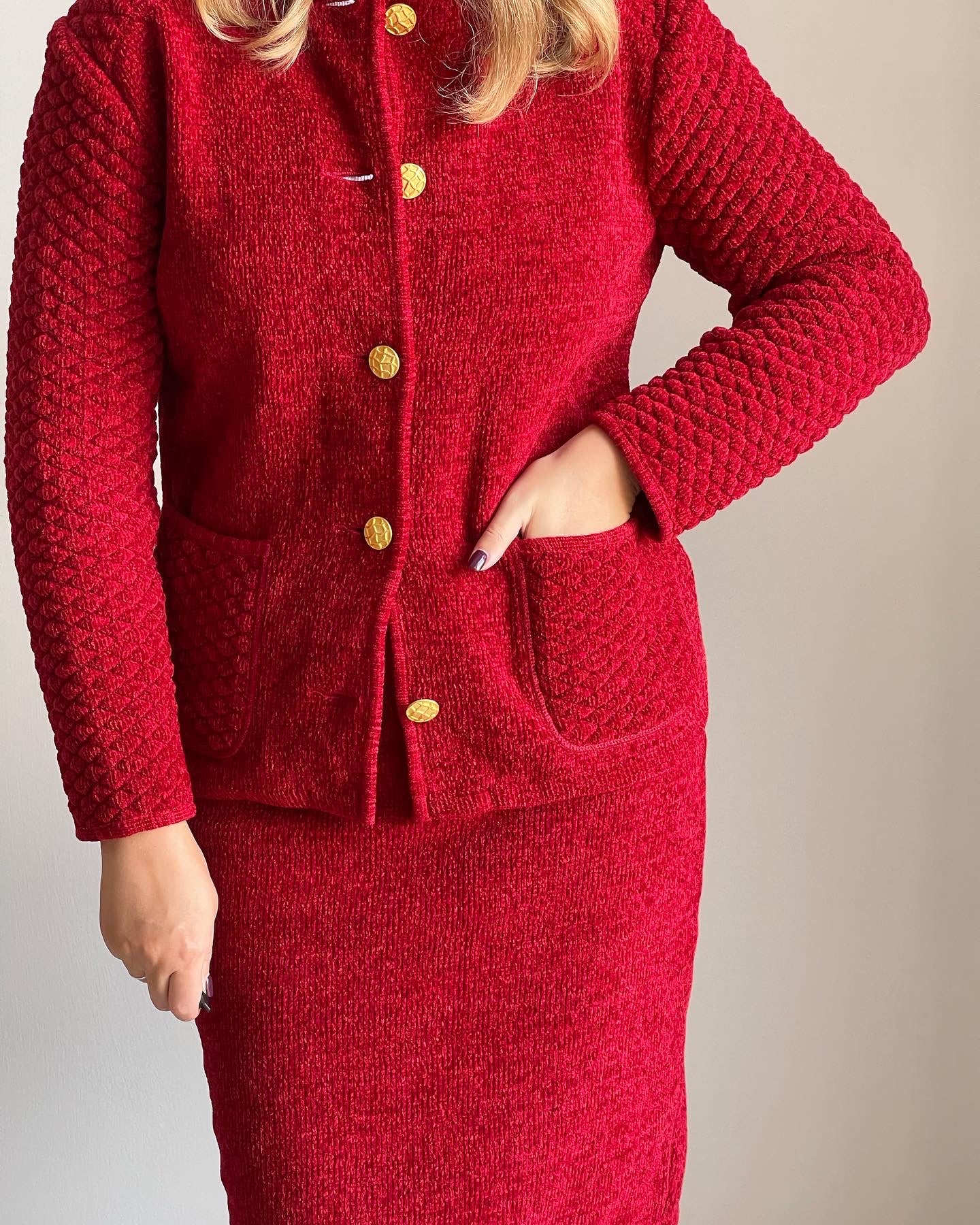 Vintage red suit with accent gold tone buttons (1980s).