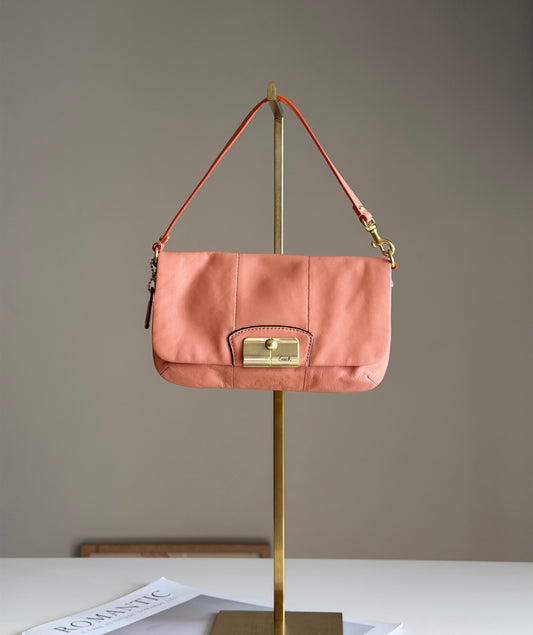 Vintage authentic Coach mini leather coral bag