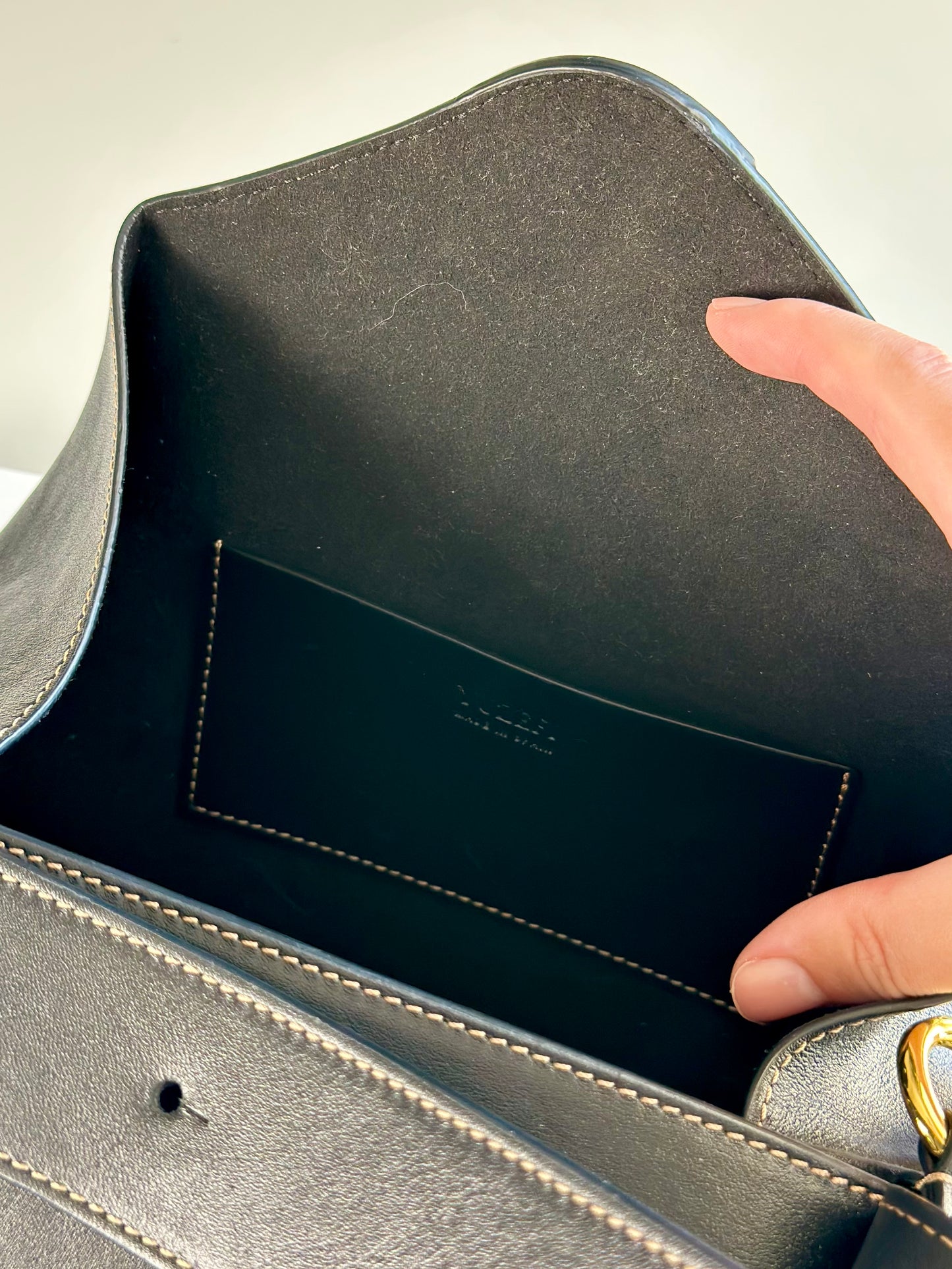 Stunning Yuzefi Loaf Bag crafted from black leather