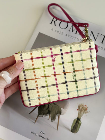 Lovely vintage Coach mini wristlet in playful plaid
