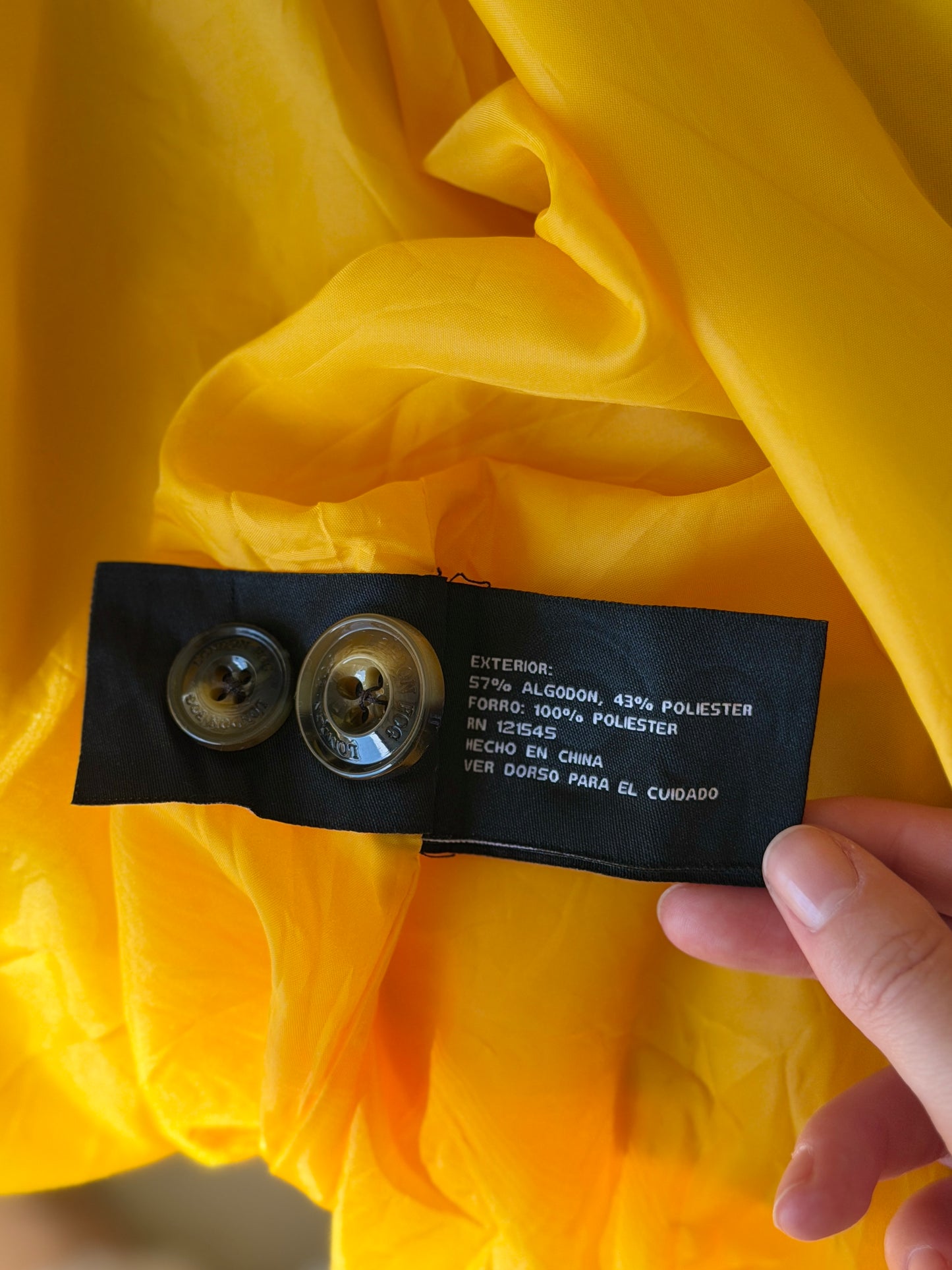 Vibrant yellow London Fog trench coat