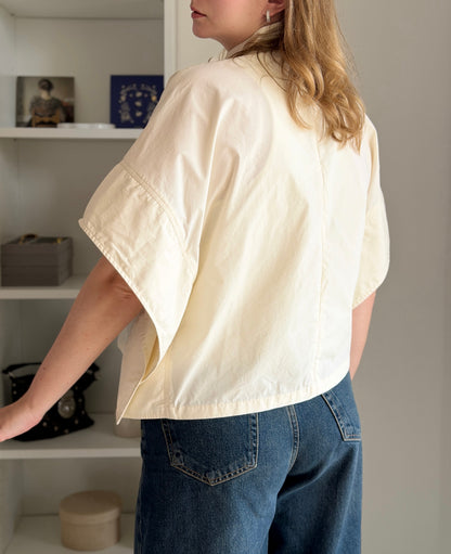 Minimalist cotton top in a soft cream shade