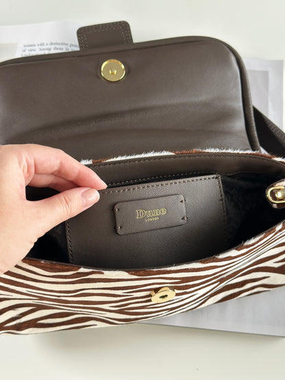 Striking Dune London shoulder zebra bag