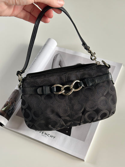 Timeless vintage authentic Coach wristlet bag