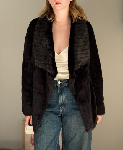 Stunning black faux fur coat with a dramatic look