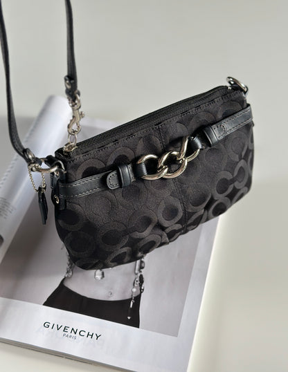 Timeless vintage authentic Coach wristlet bag