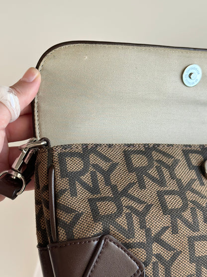 Chic vintage DKNY baguette bag with a rich brown monogram pattern
