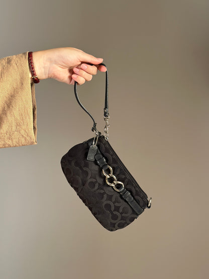 Timeless vintage authentic Coach wristlet bag