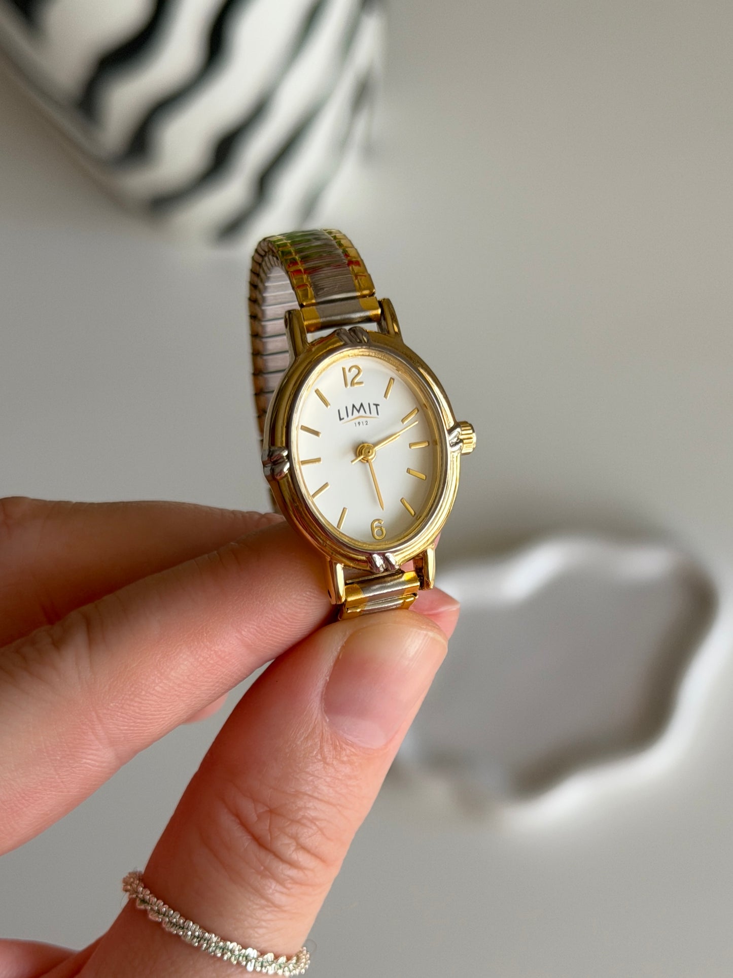 Lovely two-tone Limit watch with engraving on the case back