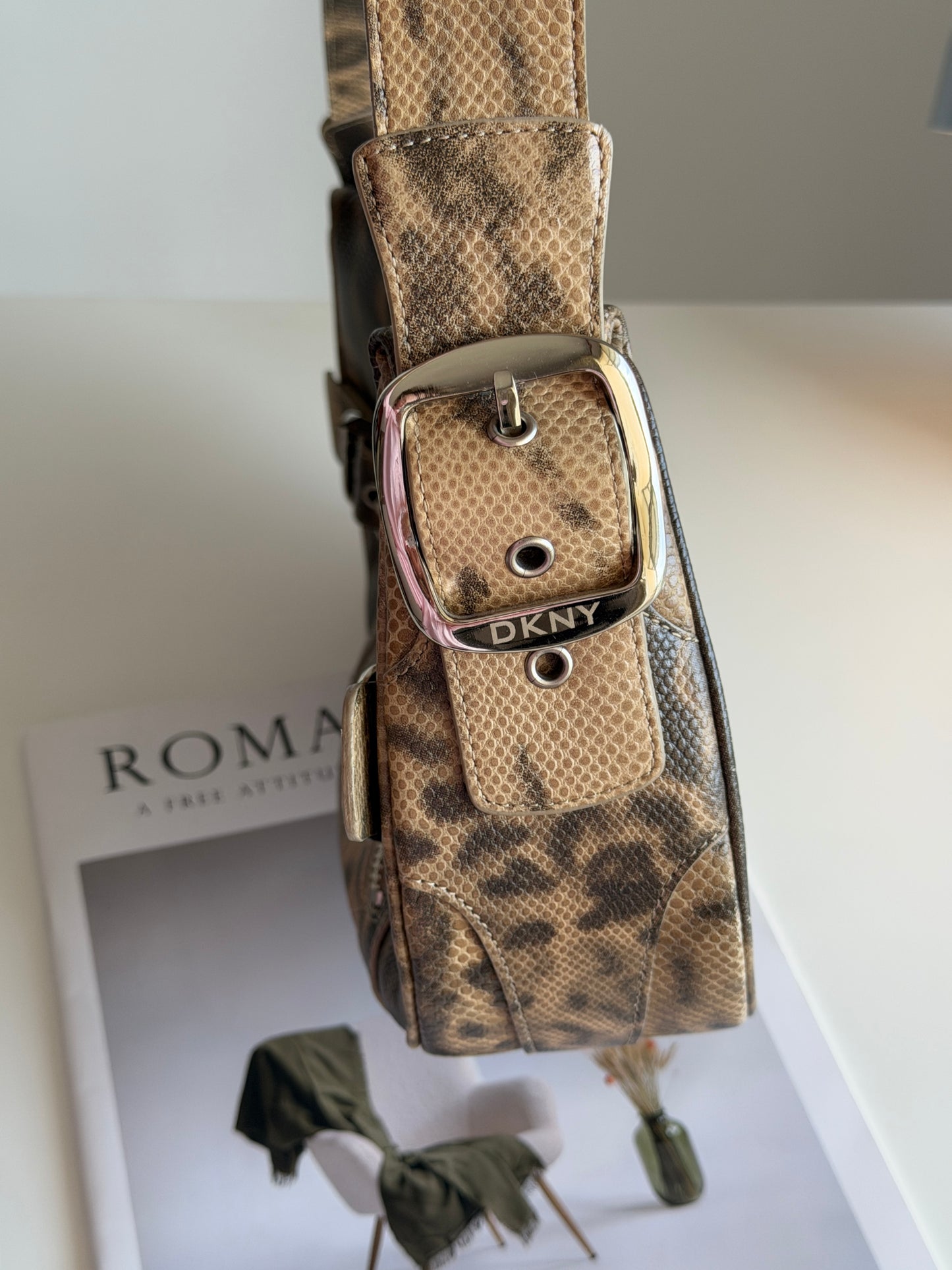 Stylish vintage DKNY shoulder bag in a snakeskin pattern