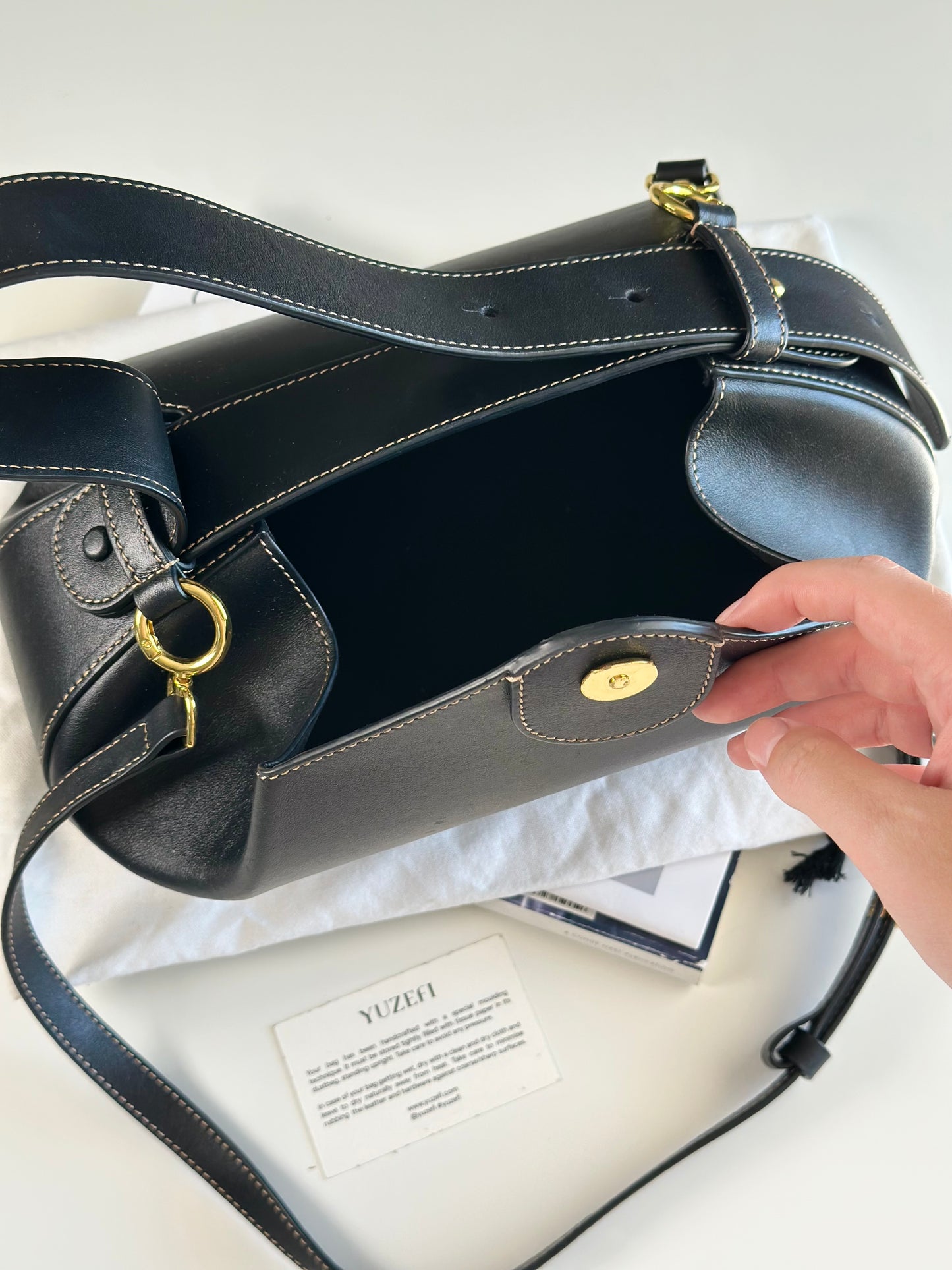 Stunning Yuzefi Loaf Bag crafted from black leather