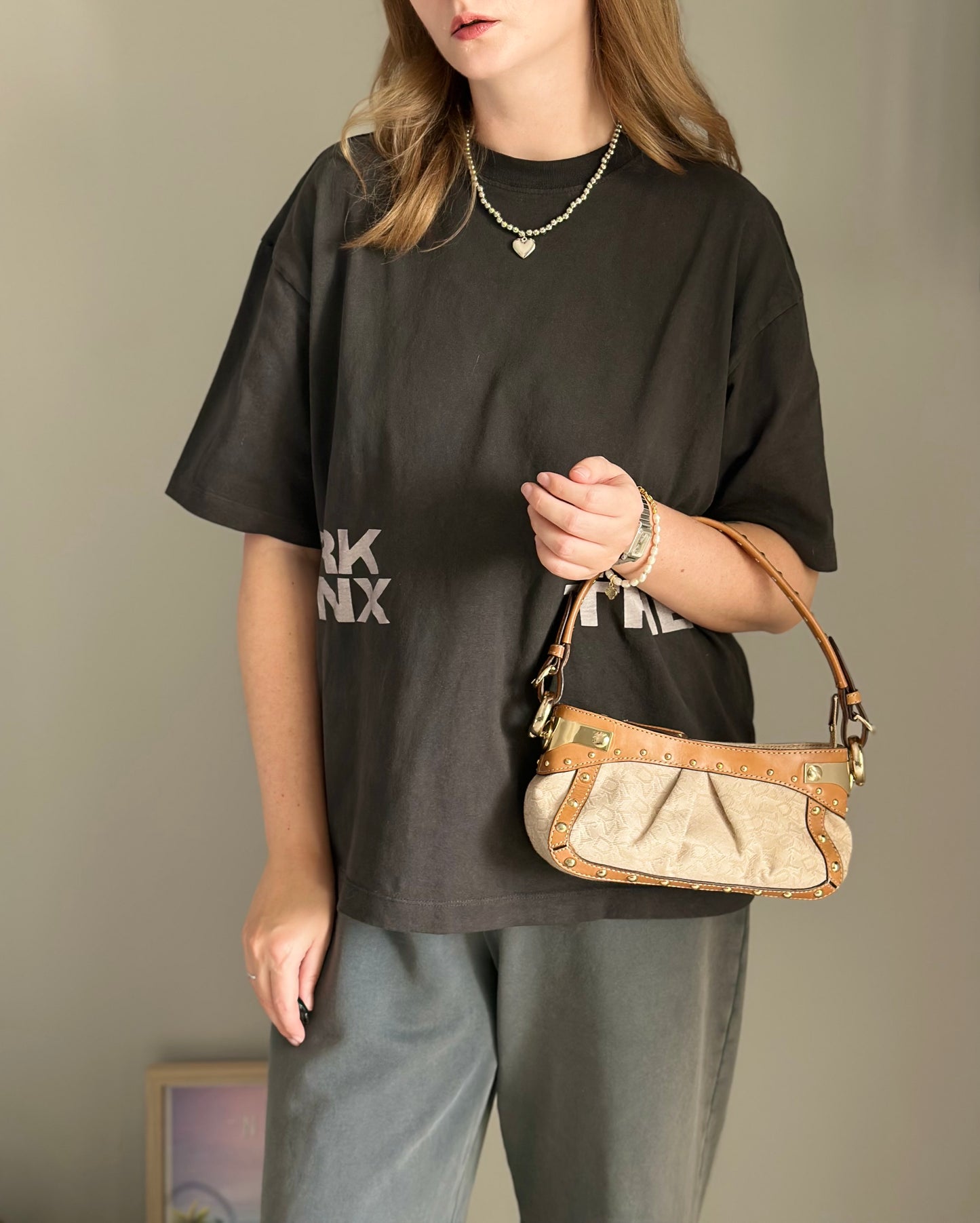 Vintage chic DKNY small bag with edgy details