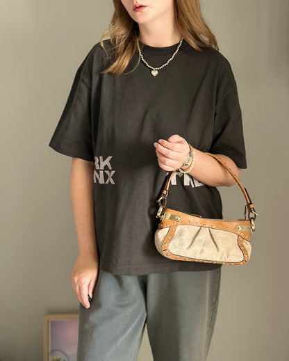 Vintage chic DKNY small bag with edgy details