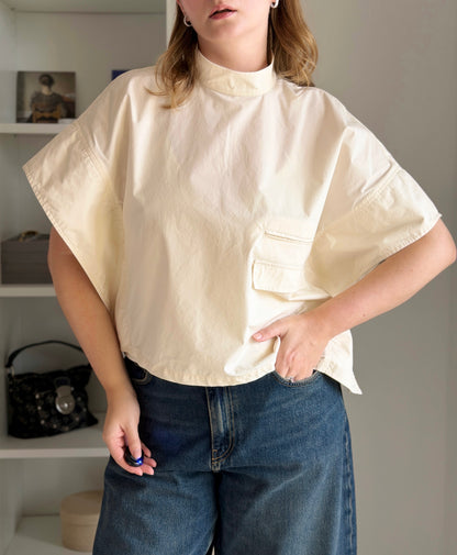 Minimalist cotton top in a soft cream shade
