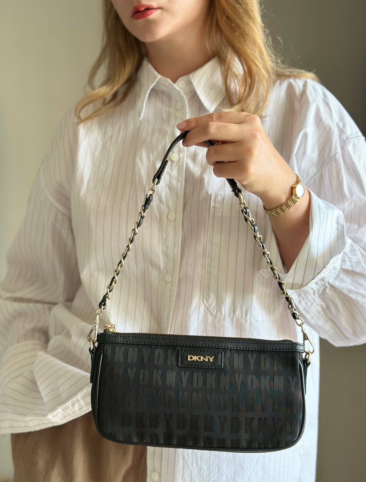 Stunning pre-loved black DKNY baguette bag