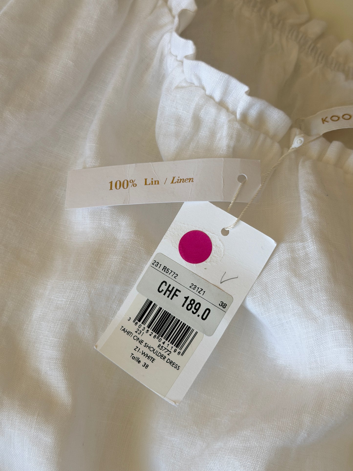Minimalist one-shoulder linen dress