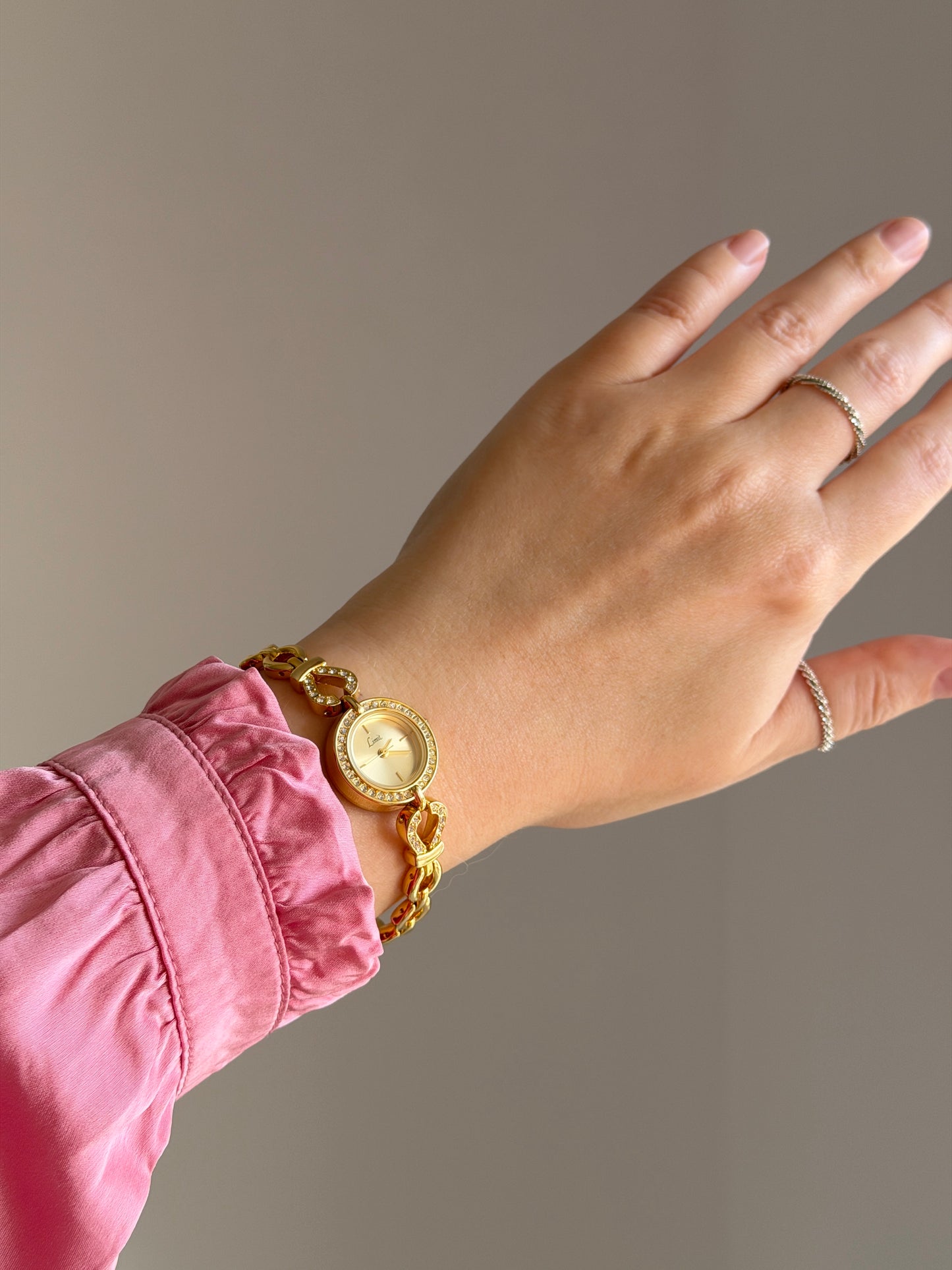 Amazing gold-tone watch Limit with rhinestones