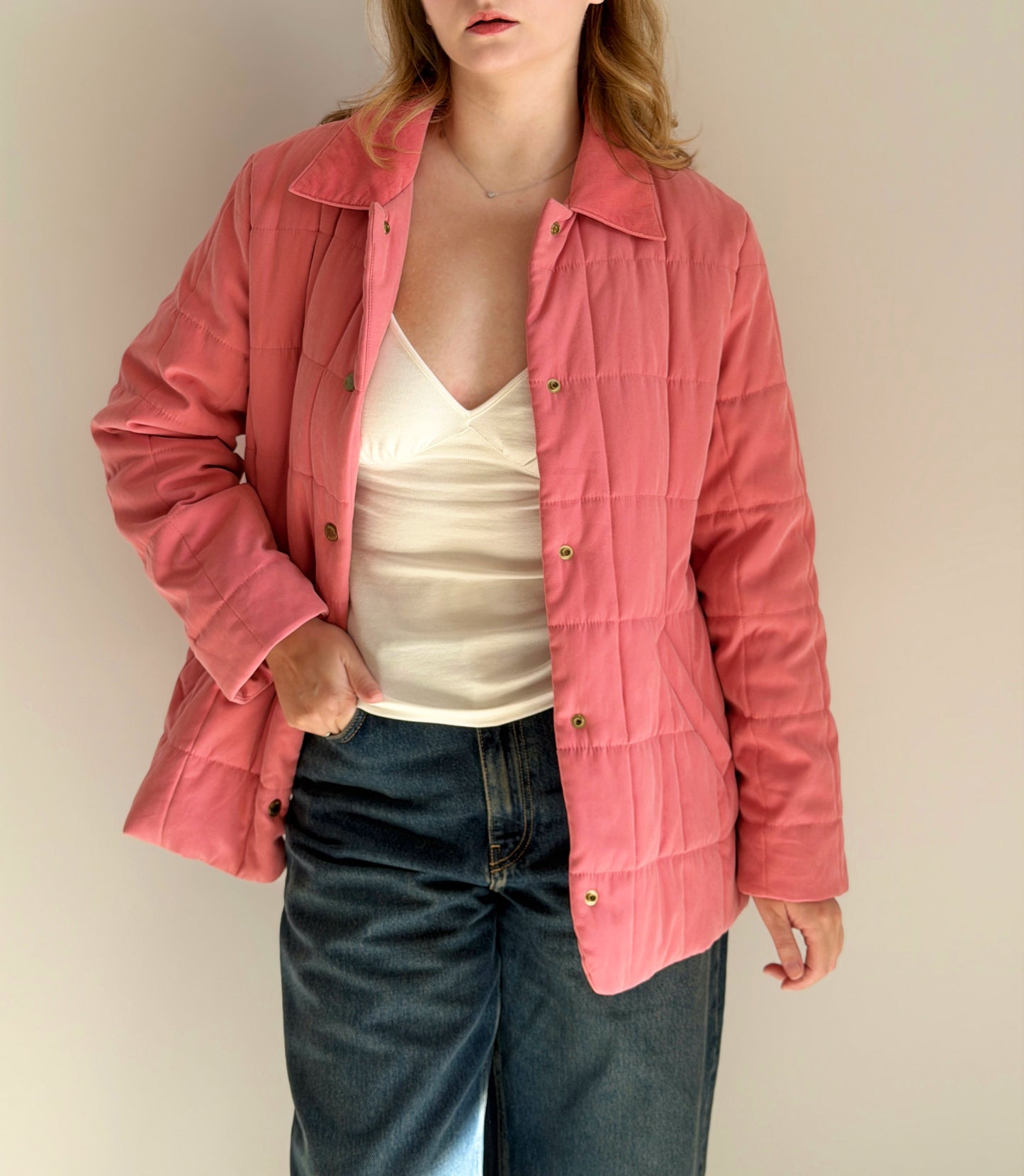 Charming quilted jacket in a soft coral pink shade