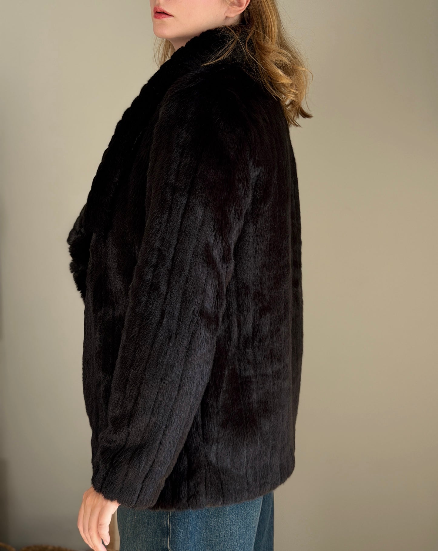 Stunning black faux fur coat with a dramatic look