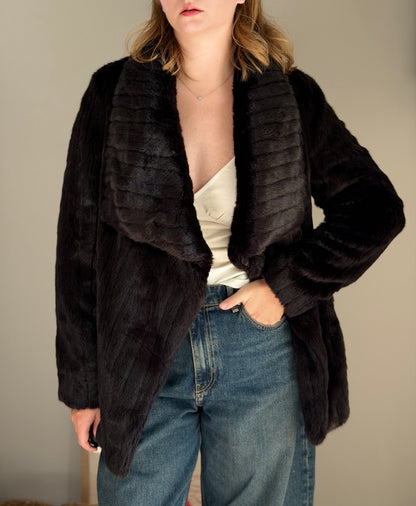 Stunning black faux fur coat with a dramatic look