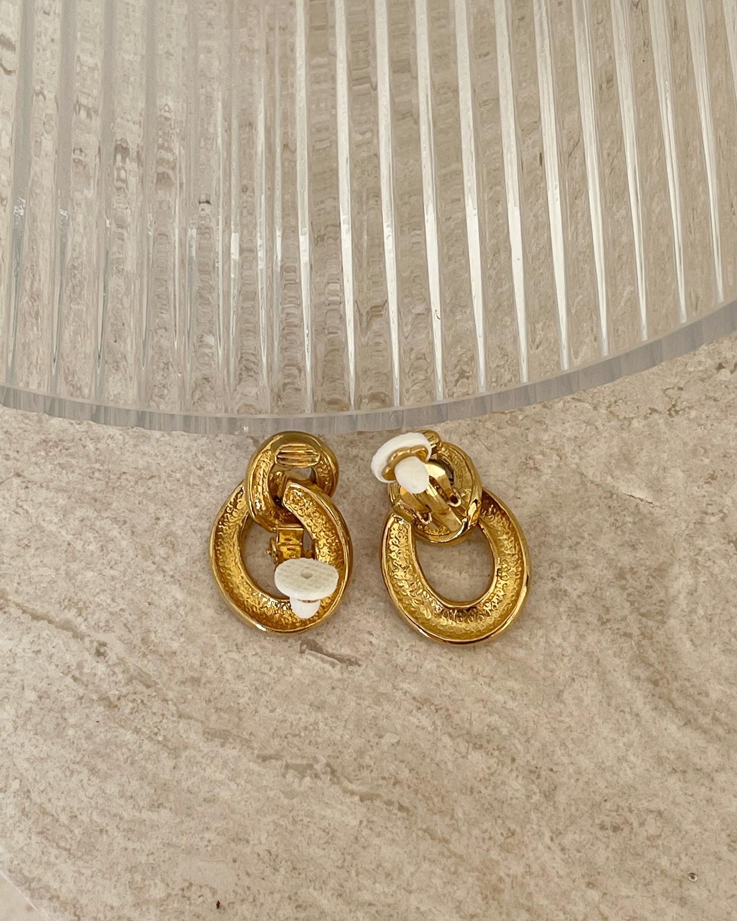 Beautiful and elegant vintage gold tone clip-on earrings with rhinestones