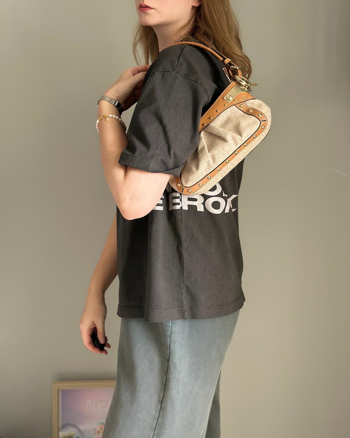 Vintage chic DKNY small bag with edgy details