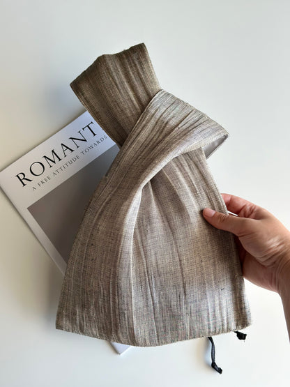 An elegant hand-held clutch