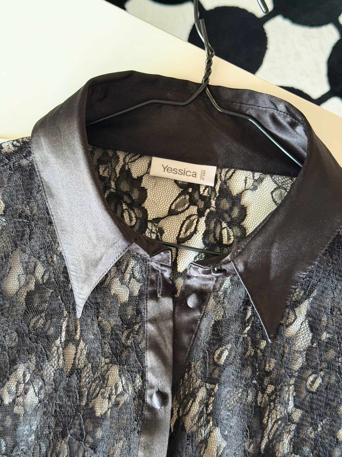 Sophisticated black lace blouse by Yessica